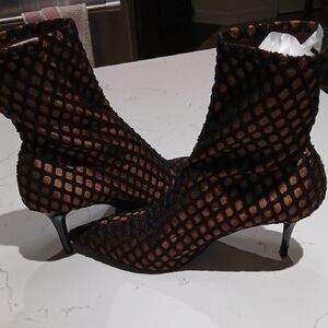 Zara Black and Brown Heeled Boots with Sleek Silhouette